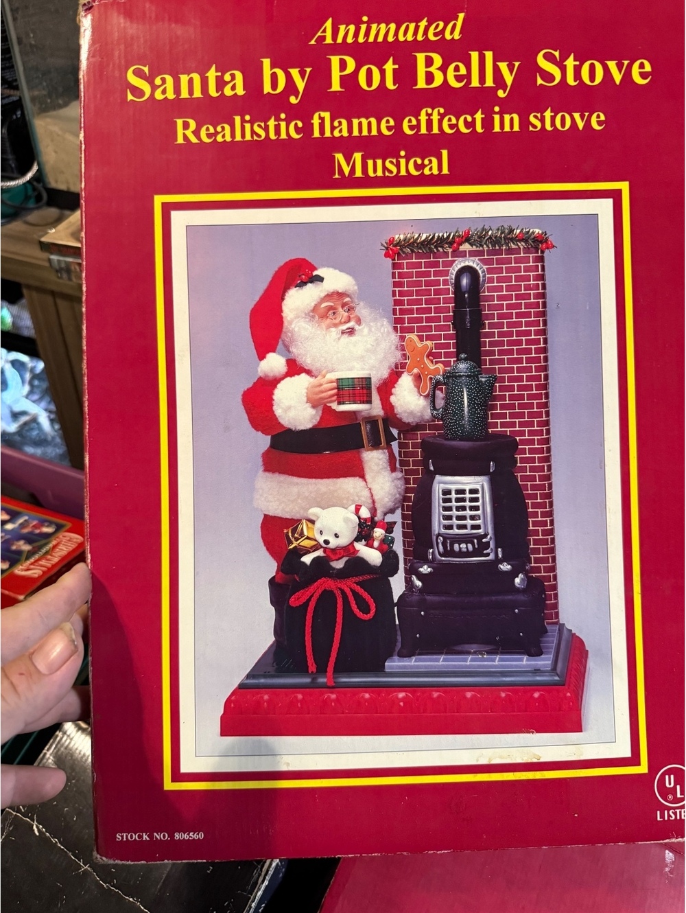 Animated Santa by Pot Belly Stove with Realistic Flame Effect and Musical